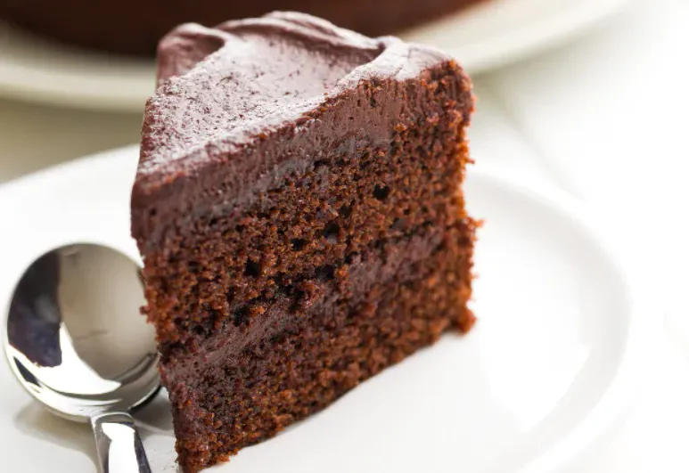 {'en': 'Chocolate cake', 'es': 'Tarta de chocolate'} Image {'en': 'Chocolate cake', 'es': 'Tarta de chocolate'} Image